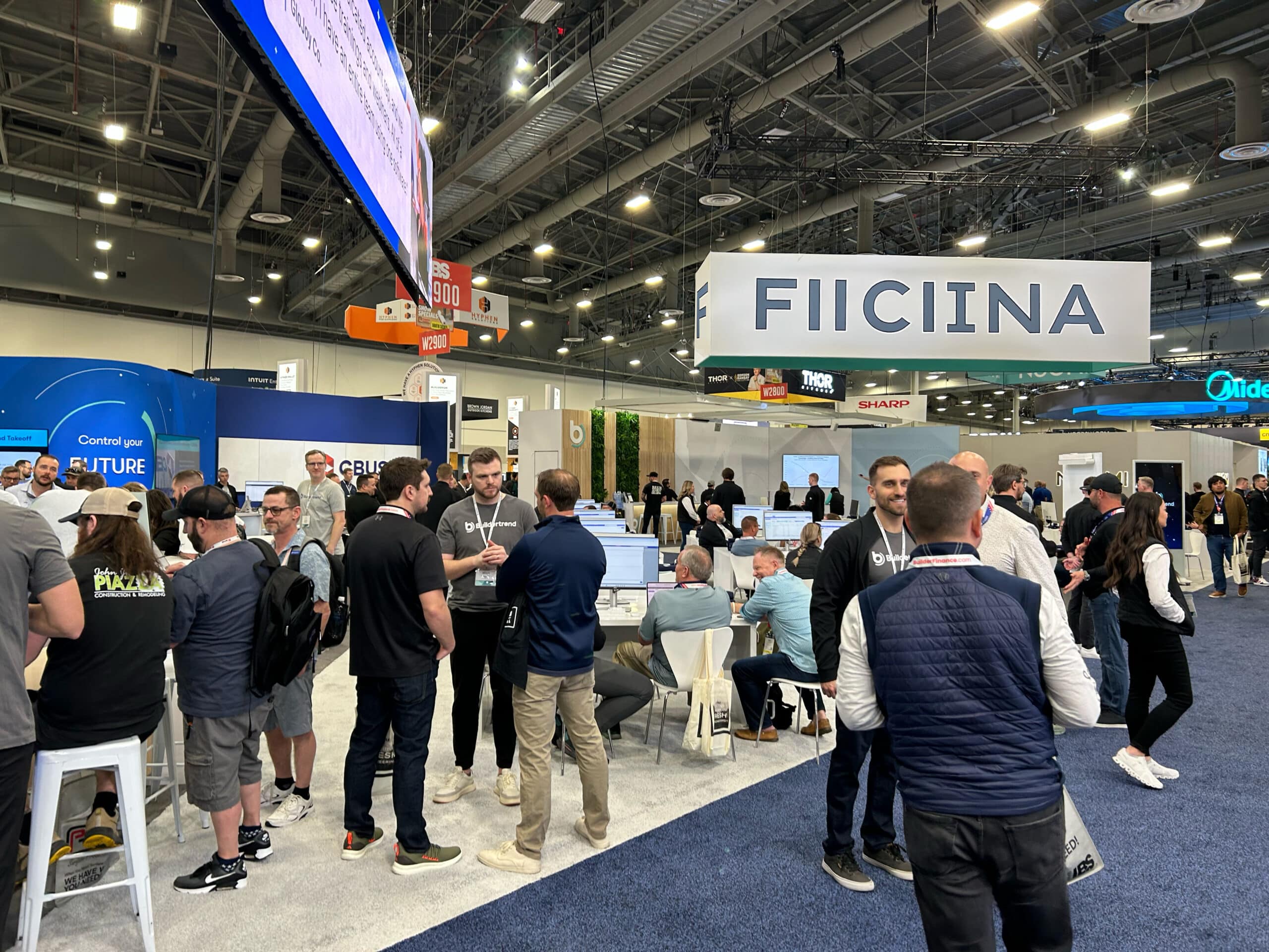 Builders walk the show floor at a trade show